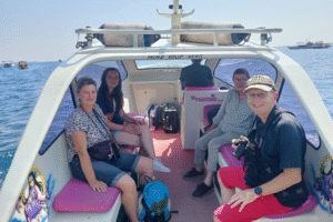 French Family Adventure: Effortless Private Speedboat Ride from Teluk Nare to Gili Air with All Their Luggage in Tow