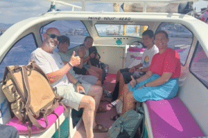 Island Hopping in Style: Marie’s Smooth Private Speedboat Ride from Gili Trawangan to Teluk Nare with Five Backpacks and Belgian Vibes