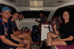 Evening Island Escape: Belgian Friends’ Effortless Private Speedboat Ride from Teluk Nare to Gili Trawangan with Backpacks in Tow
