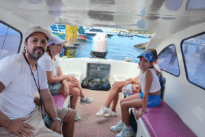 Spanish Friends’ Morning Escape: Effortless Private Speedboat Ride from Gili Trawangan to Teluk Nare with Luggage in Tow