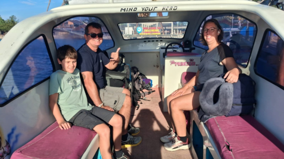 French Family Adventure: Afternoon Private Speedboat Ride from Teluk Nare to Gili Air with Backpacks in Tow