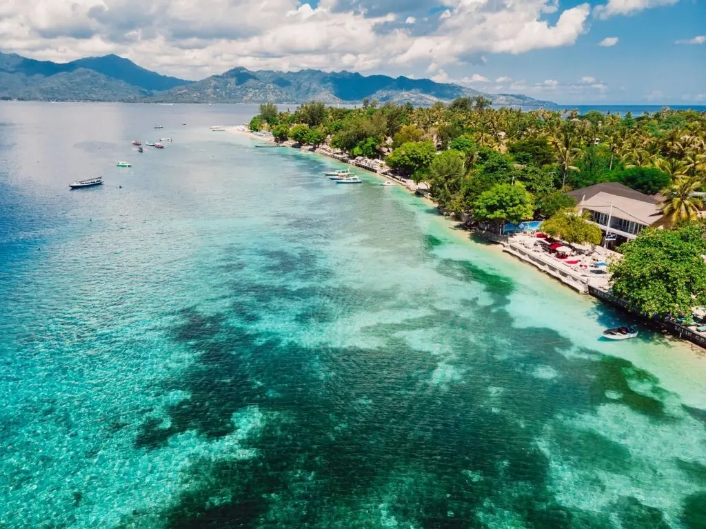 Beautiful tropical island with crystal ocean, aerial view. Gili islands