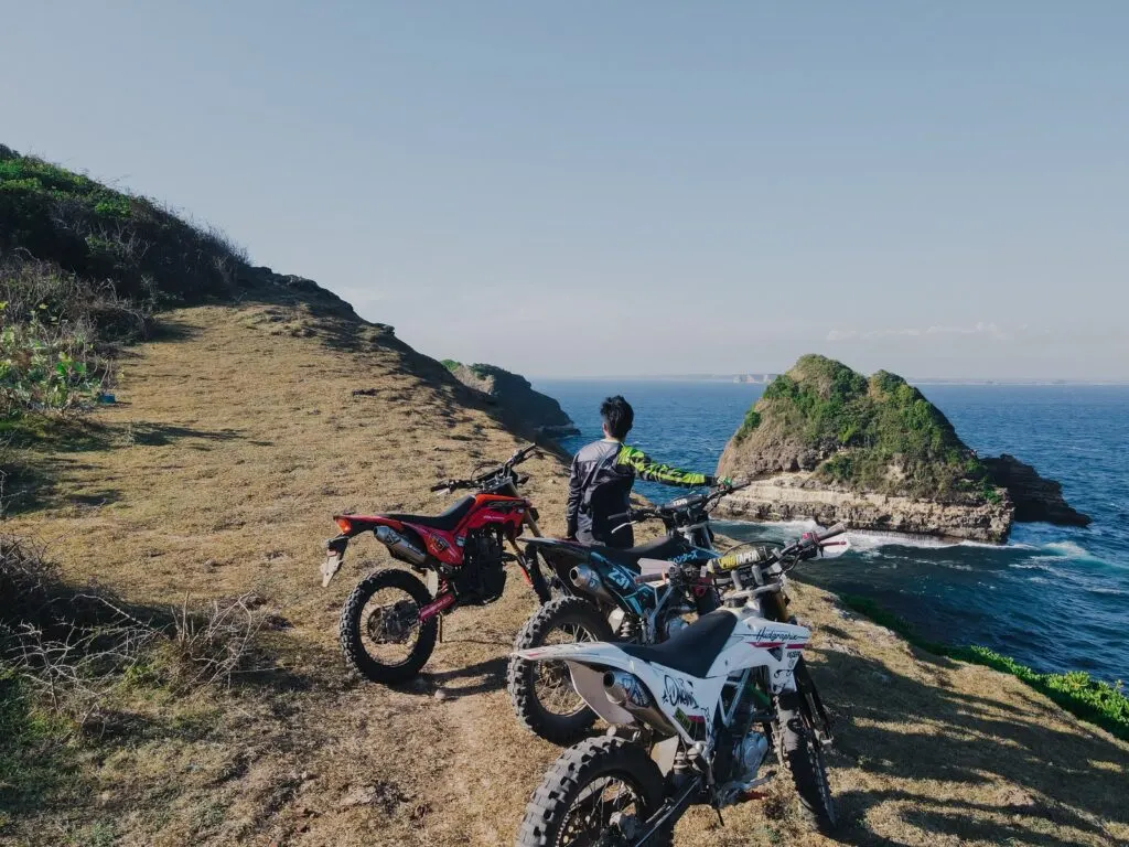 Aerial view of hills and ocean on Gunung Tunak dirt bike route Lombok