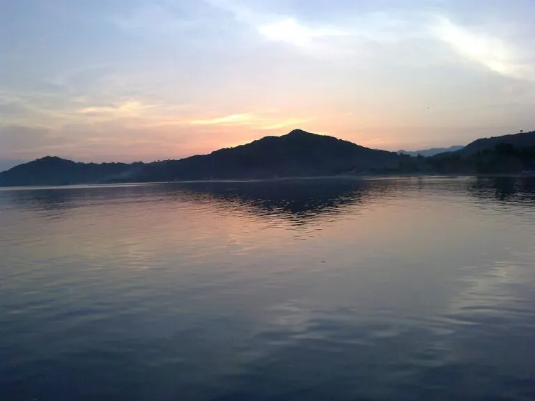 Sunrise over Sekotong harbour, West Lombok — access region for Desert Point