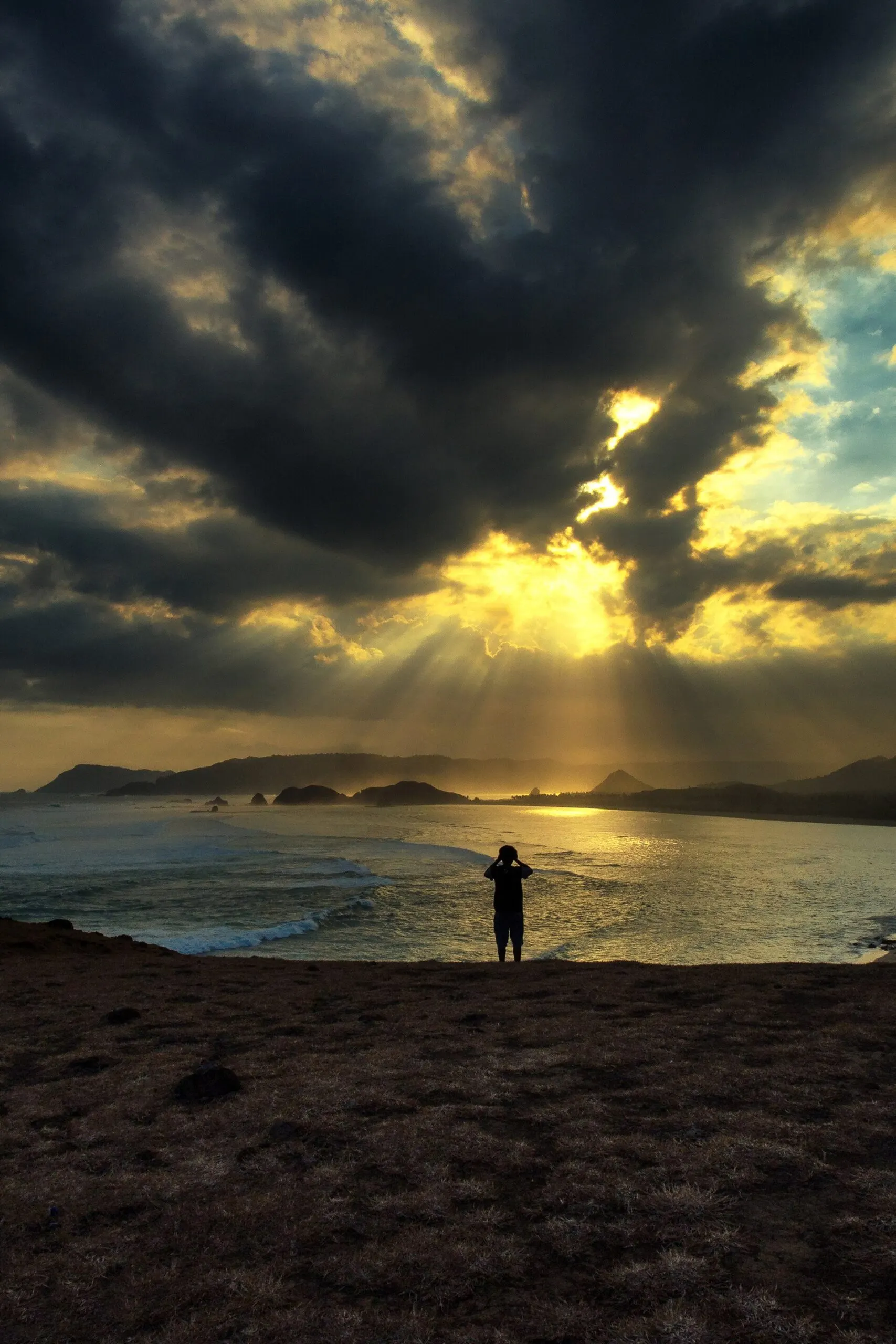 Grassy Bukit Merese hilltop overlooking the south Lombok coast