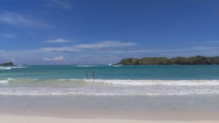 Wide coastal view of Tanjung Aan Beach, South Lombok