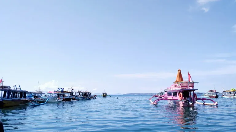Boat approach toward Pantai Tangsi Pink Beach